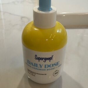 Supergoop! Yellow and White Skincare Suncare